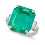 A FINE 9.33 CARAT COLOMBIAN EMERALD AND DIAMOND RING in platinum, set with an octagonal step cut ...