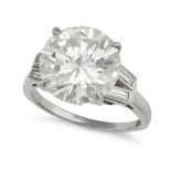 A SOLITAIRE DIAMOND ENGAGEMENT RING in platinum, set with a round brilliant cut diamond of approx...