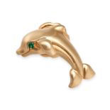CARTIER, AN EMERALD DOLPHIN PIN / BROOCH in 18ct yellow gold, designed as a dolphin, the eye set ...
