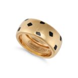 CARTIER, AN ENAMEL PANTHERE RING in 18ct yellow gold, the wide gold band accented with spots of b...