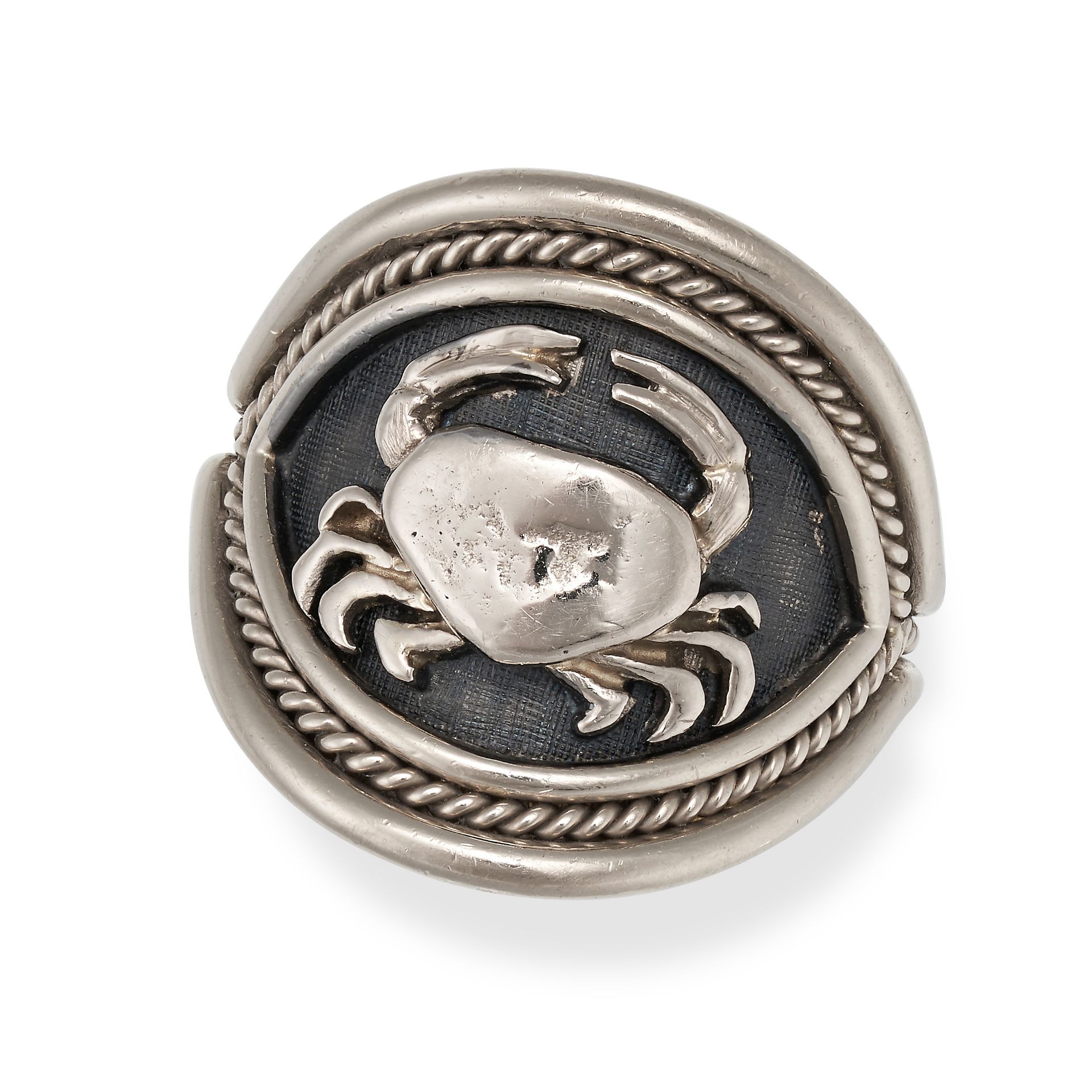 ELIZABETH GAGE, A ZODIAC RING in 18ct white gold, with the Cancer zodiac symbol to a brushed gold...