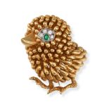KUTCHINSKY, A VINTAGE EMERALD AND DIAMOND CHICK BROOCH in 18ct yellow gold, designed as a stylise...