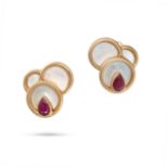 A PAIR OF MOTHER OF PEARL AND RUBY CLIP EARRINGS in 18ct yellow gold, each comprising three circu...
