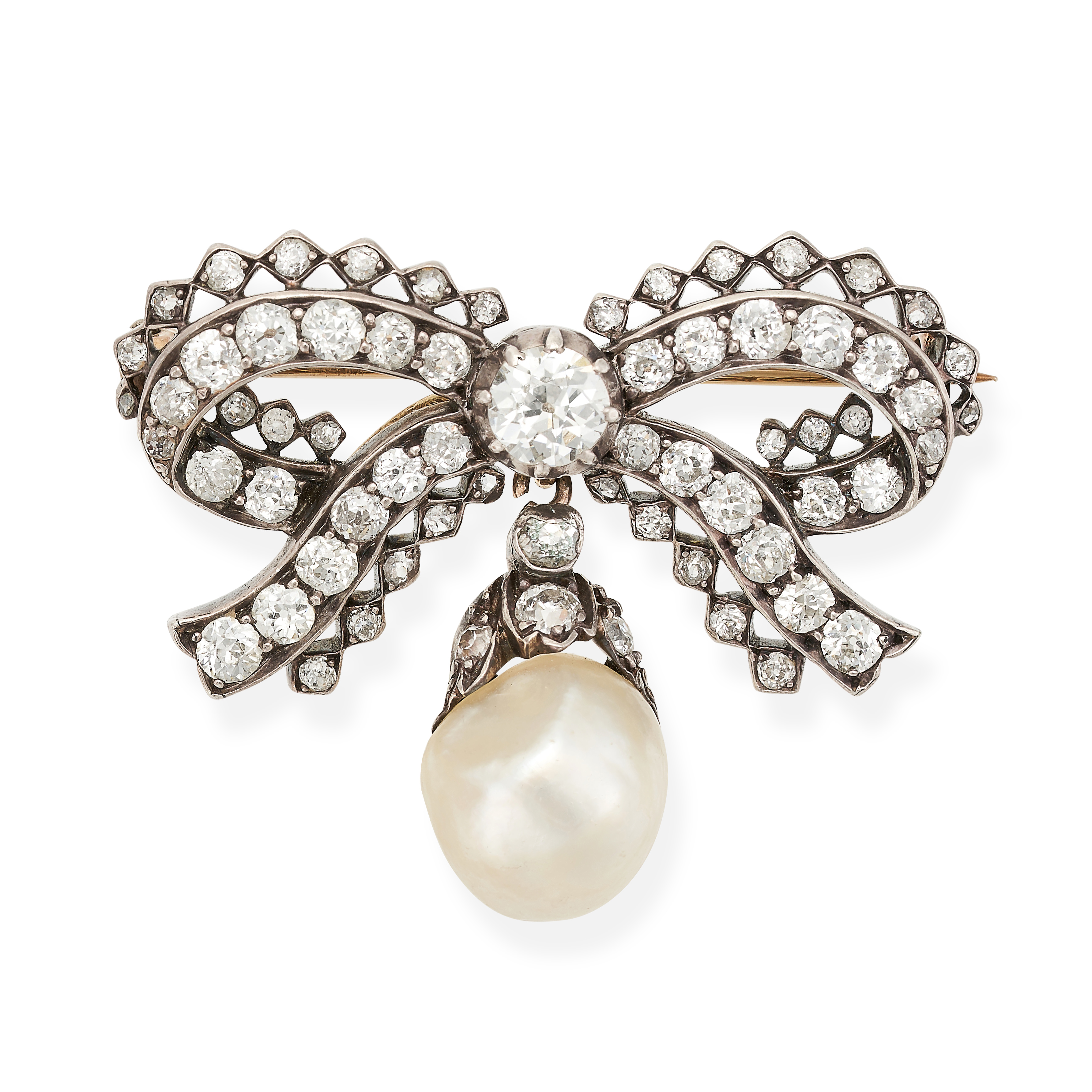NO RESERVE - AN ANTIQUE DIAMOND AND PEARL BOW BROOCH in yellow gold and silver, designed as a bow...