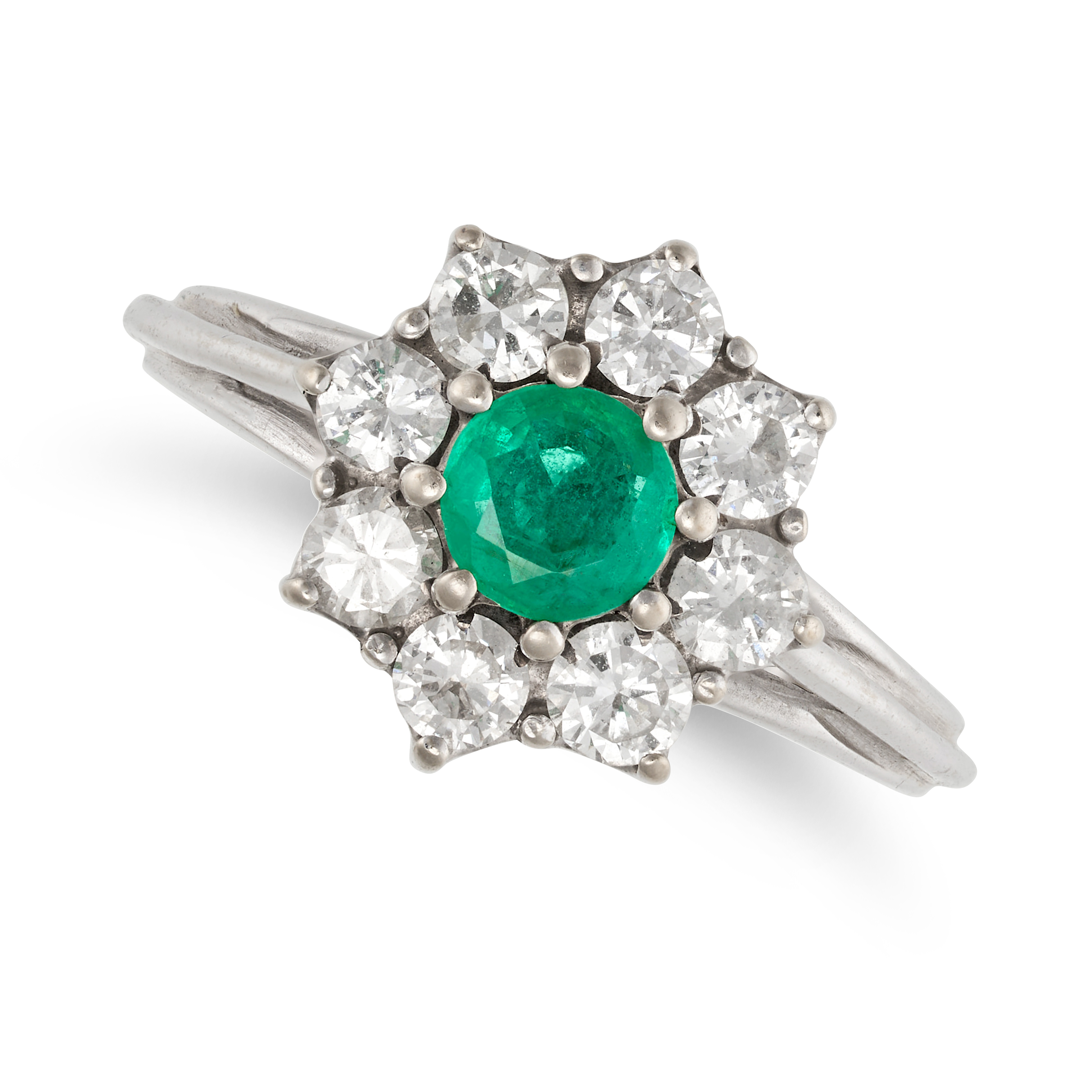 AN EMERALD AND DIAMOND CLUSTER RING in 18ct white gold, set with a round cut emerald in a cluster...