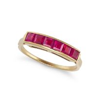 NO RESERVE - A SYNTHETIC RUBY RING in 18ct yellow gold, set with six square step cut synthetic ru...