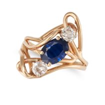 NO RESERVE - A SAPPHIRE AND DIAMOND THREE STONE RING in 14ct yellow gold, set with an oval cut sa...