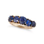NO RESERVE - AN ANTIQUE SAPPHIRE FIVE STONE RING in yellow gold, set with five cushion cut sapphi...