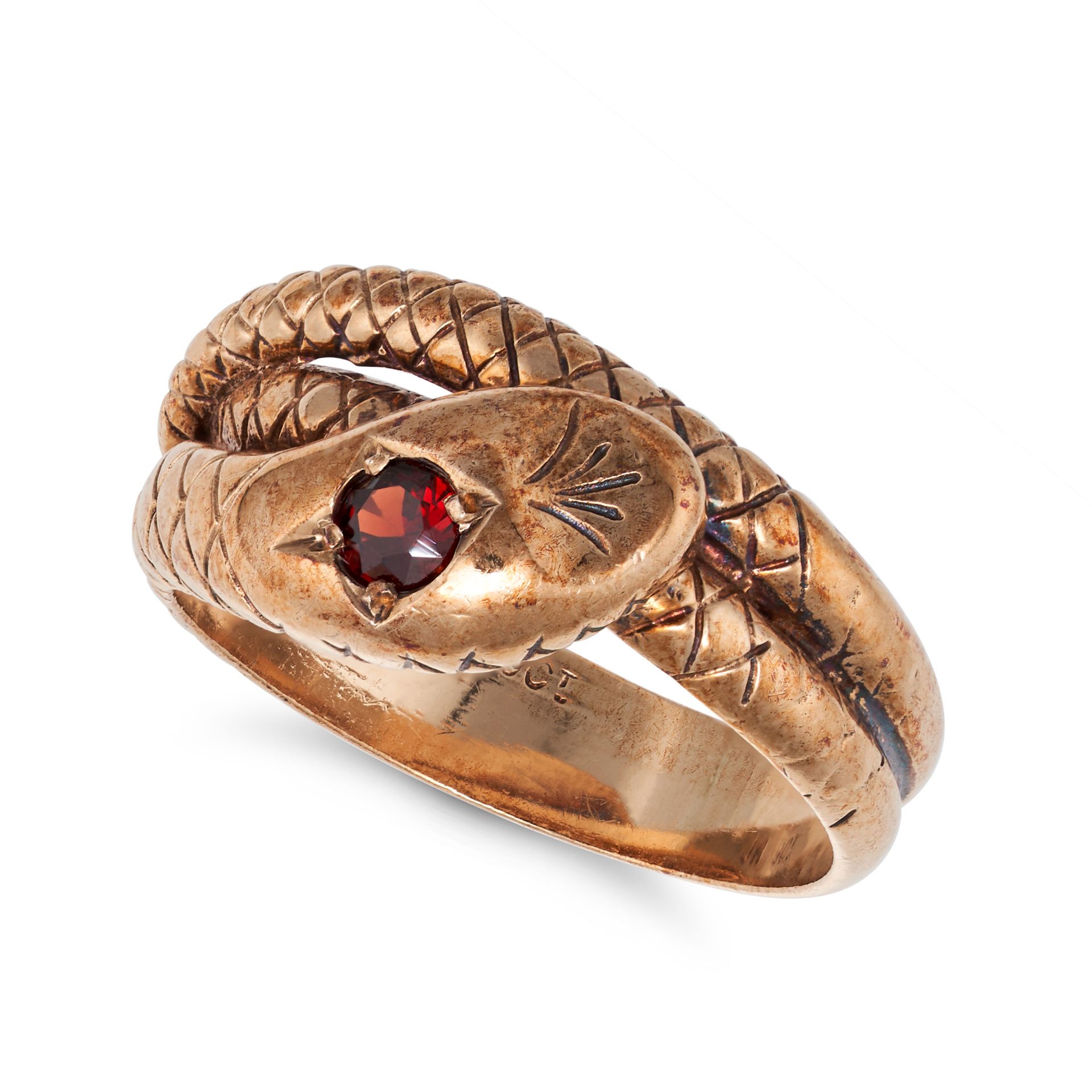 NO RESERVE - AN ANTIQUE GARNET SNAKE RING in 9ct yellow gold, designed as an engraved coiled snak...
