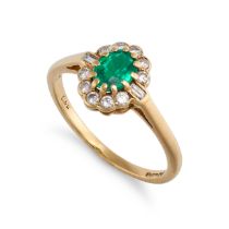 NO RESERVE - AN EMERALD AND DIAMOND CLUSTER RING in 18ct yellow gold, set with an oval cut emeral...