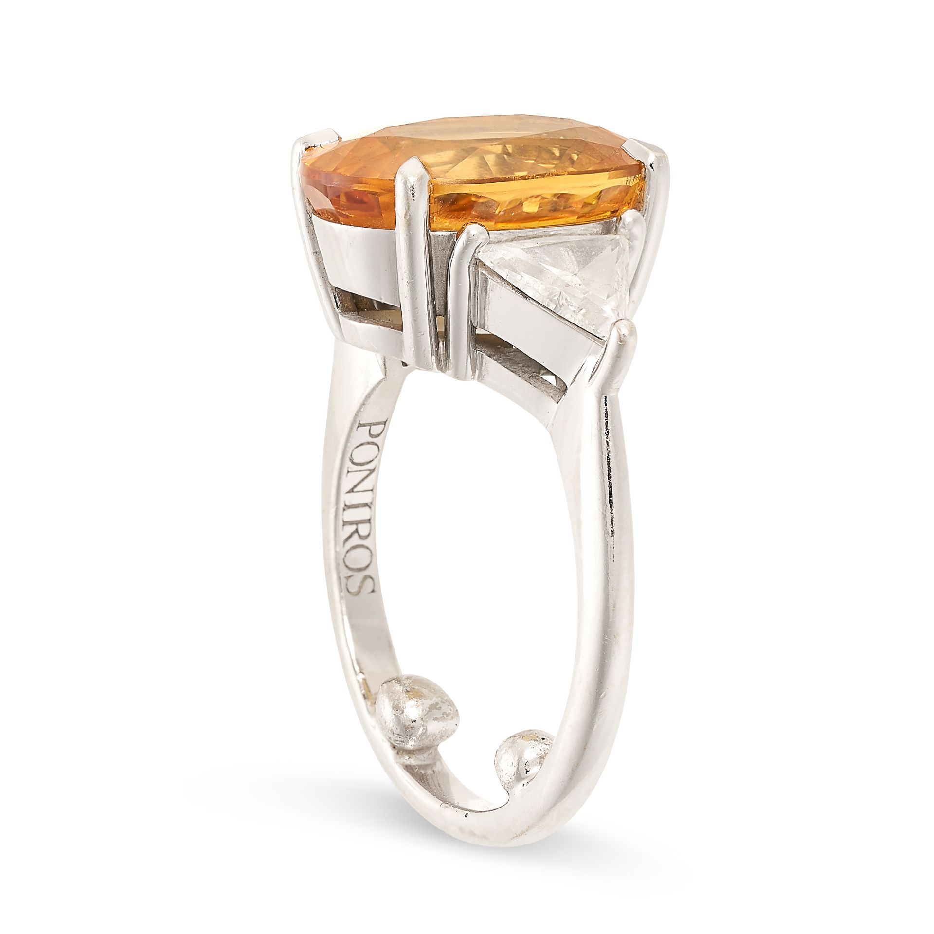 NO RESERVE - A YELLOW SAPPHIRE AND DIAMOND RING in 18ct white gold, set with an oval cut yellow s... - Image 2 of 2