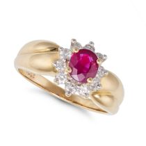 NO RESERVE - A RUBY AND DIAMOND CLUSTER RING in 18ct yellow gold, set with an oval cut ruby in a ...