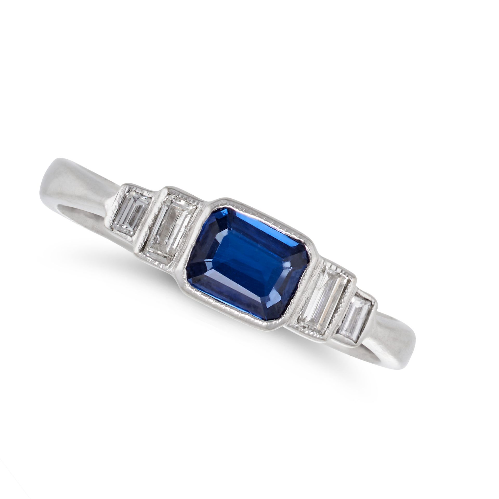 NO RESERVE - A SAPPHIRE AND DIAMOND RING in 18ct white gold, set with an octagonal step cut sapph...
