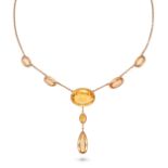 A CITRINE PENDANT NECKLACE in 9ct yellow gold, the chain set with graduating oval cut citrines, s...