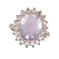 A PURPLE FLUORITE AND DIAMOND CLUSTER RING in 18ct white gold, set with an oval mixed cut fluorit...