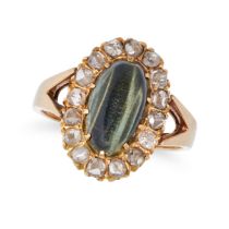 NO RESERVE - A CAT'S EYE CHRYSOBERYL AND DIAMOND CLUSTER RING in 9ct yellow gold, set with a cabo...