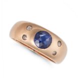 NO RESERVE - A SYNTHETIC SAPPHIRE AND DIAMOND GYPSY RING in yellow gold, set with a round cut syn...