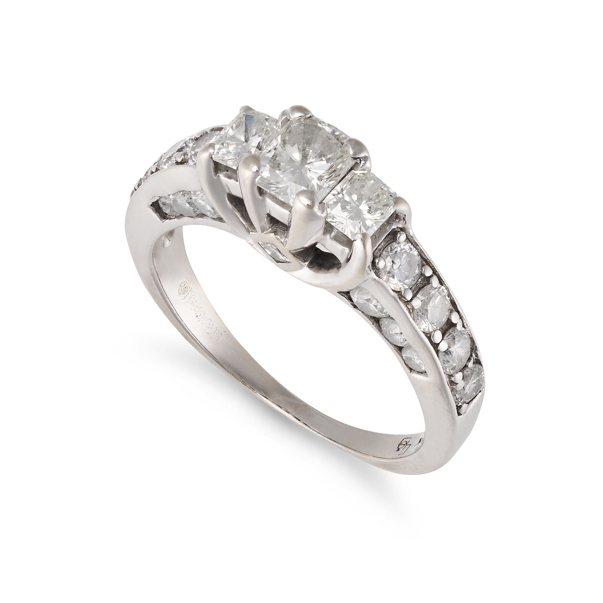 A DIAMOND RING in 14ct white gold, set with three principal radiant cut diamonds, the band and ga...