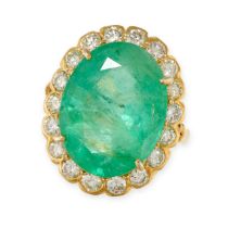 NO RESERVE - AN EMERALD AND DIAMOND CLUSTER RING in 14ct yellow gold, set with an oval cut emeral...