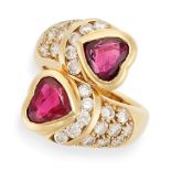 NO RESERVE - A RUBY AND DIAMOND TOI ET MOI RING in 18ct yellow gold, the twisted shank set with t...
