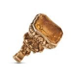 AN ANTIQUE CITRINE FOB SEAL the ornate fob terminating with a fancy shaped citrine carved with a ...