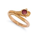 A RUBY AND SNAKE RING in yellow gold, designed as a coiled snake, the head set with a cushion cut...