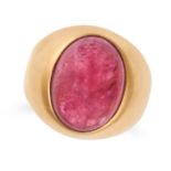A PINK TOURMALINE DRESS RING in 18ct yellow gold, set with a cabochon pink tourmaline of approxim...