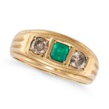 AN EMERALD AND DIAMOND GYPSY RING in 18ct yellow gold, set with an octagonal step cut emerald bet...