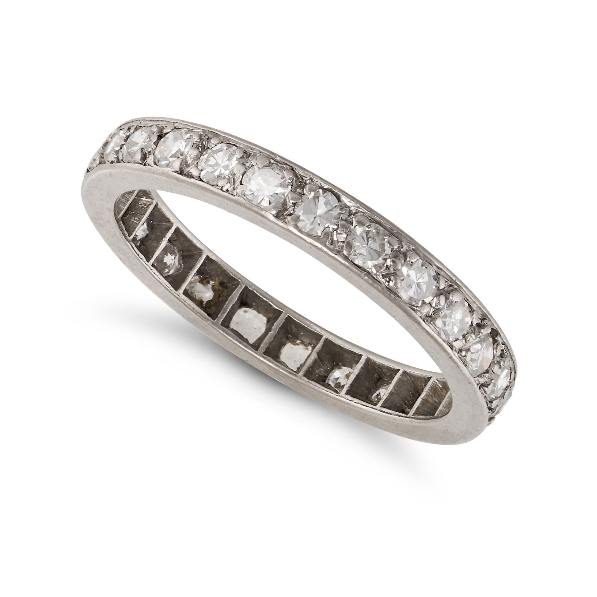 A DIAMOND ETERNITY RING in platinum, set throughout with round brilliant cut diamonds, no assay m...