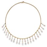 AN ANTIQUE PINK TOPAZ AND AQUAMARINE FRINGE NECKLACE in yellow gold, comprising a fancy link chai...