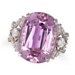 A KUNZITE AND DIAMOND RING in platinum, set with a cushion cut kunzite of 27.16 carats, the styli...
