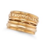 BOUCHERON, A GOLD DRESS RING in 18ct yellow gold, the stylised double band crossing over at the b...