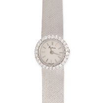 KUTCHINSKY - A LADIES DIAMOND KUTCHINSKY WRISTWATCH in 18ct white gold, 17 jewel manual wind move...