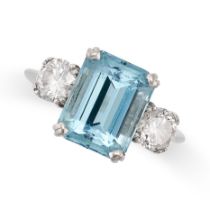 AN AQUAMARINE AND DIAMOND THREE STONE RING in 18ct white gold, set with an octagonal step cut aqu...