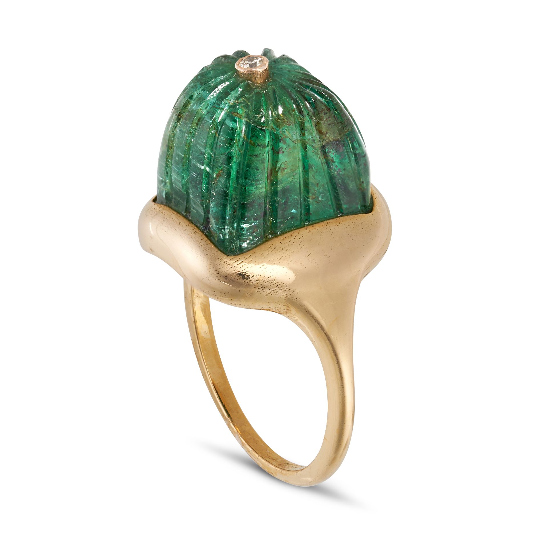 A CARVED EMERALD AND DIAMOND DRESS RING in 14ct yellow gold, set with a carved emerald accented b...