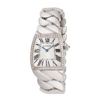 CARTIER - A CARTIER LA DONA WRISTWATCH in 18ct white gold, 2895, 1042XXXX, the silvered dial with...