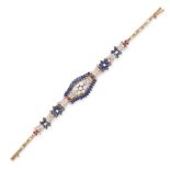 A SAPPHIRE, DIAMOND AND RUBY BRACELET in yellow gold, the stylised bracelet set throughout with r...