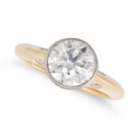 A SOLITAIRE DIAMOND RING in 18ct yellow gold, set with a round brilliant cut diamond of approxima...