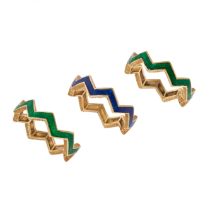 KUTCHINSKY, THREE VINTAGE ENAMEL STACKING RINGS in 18ct yellow gold, comprising three jagged eter...