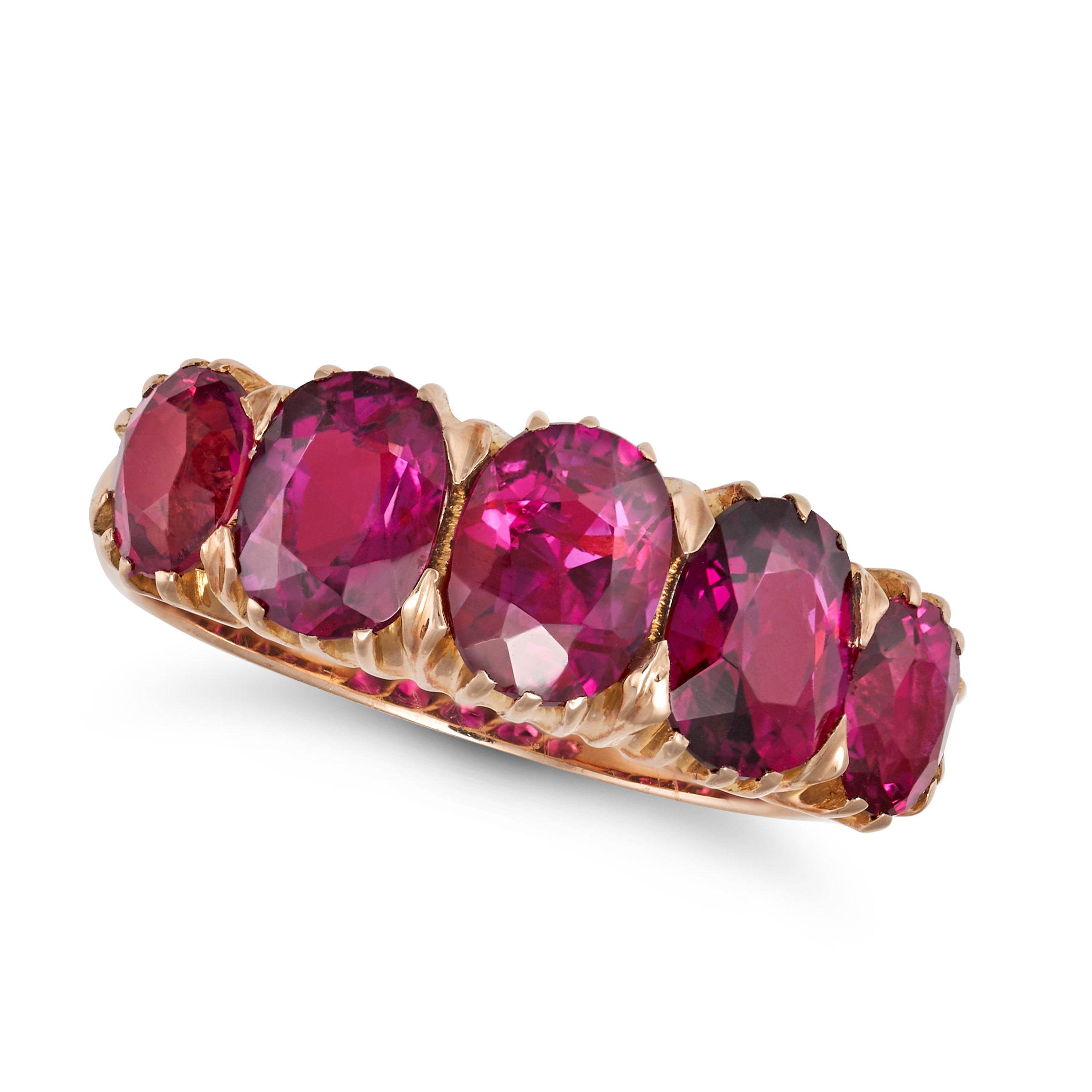 A RUBY FIVE STONE RING in yellow gold, set with five cushion cut rubies all totalling 4.0-4.3 car...
