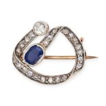 AN ANTIQUE SAPPHIRE AND DIAMOND BROOCH in yellow gold and silver, set with a cushion cut sapphire...
