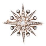 AN ANTIQUE DIAMOND STAR BROOCH / PENDANT in yellow gold and silver, designed as an eight rayed st...