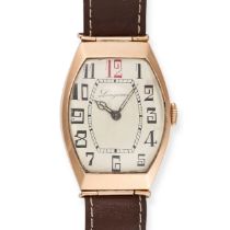 LONGINES - A VINTAGE LONGINES TONNEAU DRESS WATCH in 14ct gold, 16 jewel manual wind movement, th...