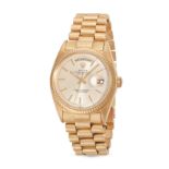 ROLEX - A ROLEX OYSTER PERPETUAL DAY-DATE WRISTWATCH in 18ct yellow gold, 1803, the silvered dial...