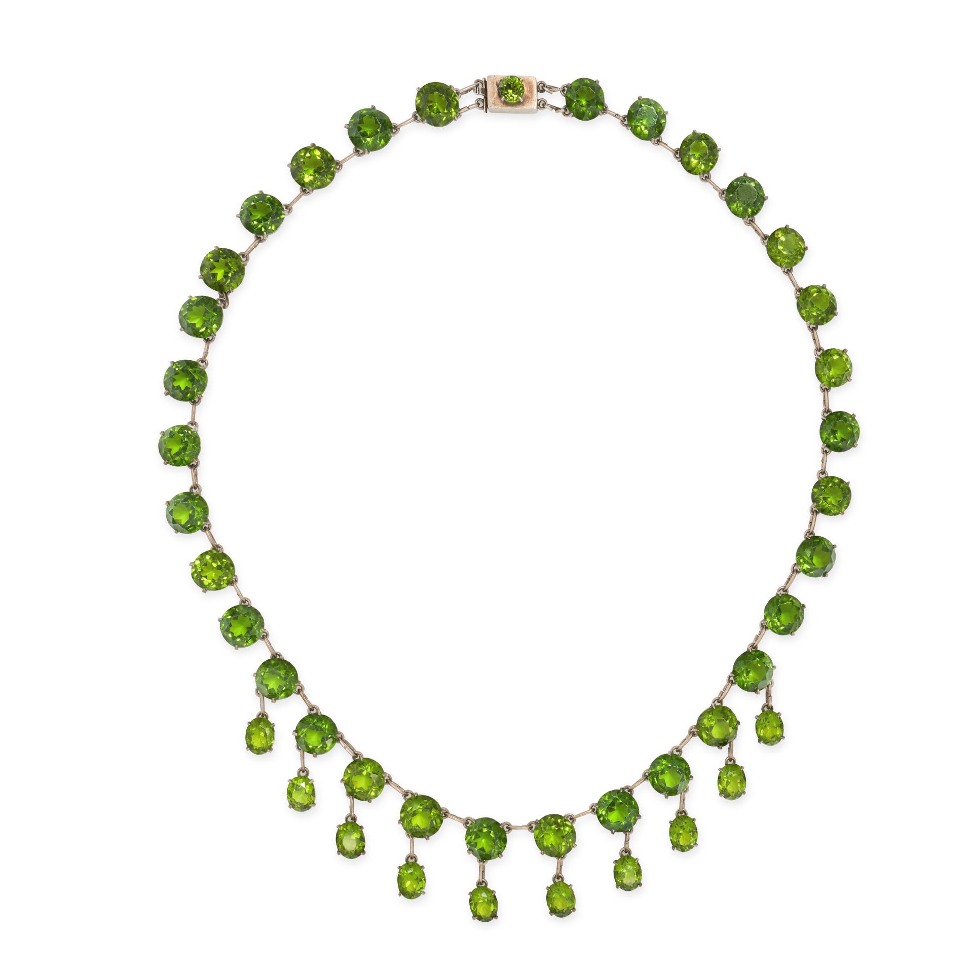 NO RESERVE - AN ANTIQUE GREEN PASTE FRINGE NECKLACE in silver, comprising a row of round cut gree...