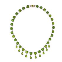 NO RESERVE - AN ANTIQUE GREEN PASTE FRINGE NECKLACE in silver, comprising a row of round cut gree...
