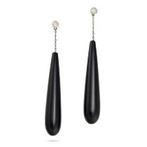 A PAIR OF ONYX AND PEARL DROP EARRINGS each set with a pearl suspending a tapering polished onyx ...