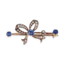 AN ANTIQUE SAPPHIRE AND DIAMOND BOW BROOCH in yellow gold and silver, designed as a bow set with ...