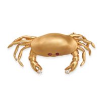 A RUBY AND DIAMOND CRAB BROOCH in 18ct yellow gold, designed as a crab, each claw holding a round...