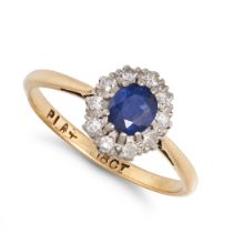 A SAPPHIRE AND DIAMOND CLUSTER RING in 18ct yellow gold and platinum, set with a cushion cut sapp...